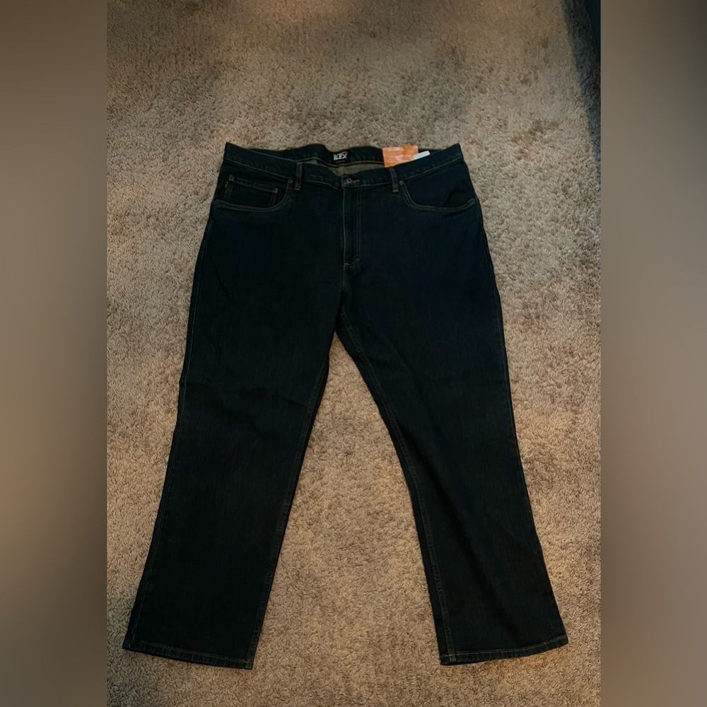 NEW MENS TIMBERLAND PRO JEANS
GRIT-N-GRIND
Dark Wash 
NWT 
Size 42 x 30